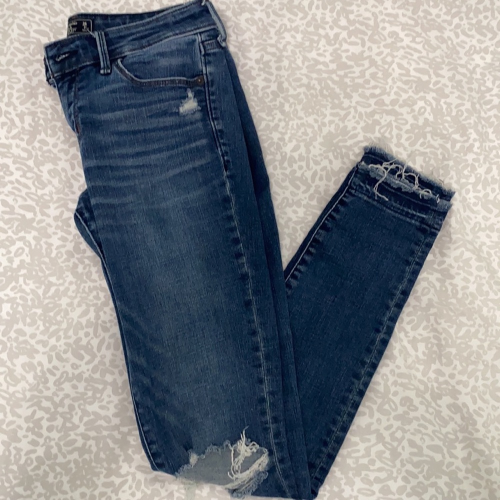medium wash ripped skinny jeans